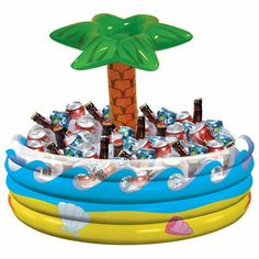 an inflatable pool filled with lots of drinks and a palm tree on top