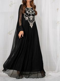 Black chiffon floor length kaftan gown for summer,embroidered long summer wear.  ✨This beautiful chiffon floor length gown has silver zari embroidery over the front.  ✨If you want any changes in the outfit please contact us we will guide you as per your preference.  ✨We assure you that we use only high quality fabric and threads to make any dress and you won't face any problem regarding Fabric and fitting.  ✨We take little longer time for manufacturing the garment as this is custom made dress and we take utmost care while manufacturing, so that our customers gets full satisfaction when they receive  the dress. Your patience is important.  ✨There may be slight difference in colour, due to high camera resolution and other filters. Rest everything will be same.  🌸Dry Clean only Chiffon Dress Plus Size, Wedding Anarkali, Long Anarkali Gown, Gown For Wedding, Kaftan Gown, Long Anarkali, Suit For Women, Floor Length Dress, Anarkali Gown