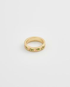 An elegant gold band graced with hand-painted enamel pink flowers, creates a delicate and feminine adornment. This ring is a celebration of the fleeting beauty of spring, a perpetual bloom captured in a timeless design. Key features: Hand-painted enamel 18K Worn-gold plated brass, enamel 5mm width band; 2mm thick-round Shabby Chic Fashion, Be Delusional, Fable England, Swan Jewelry, Chic Fashion Style, Luxury Christmas Gifts, Luxury Scarves, Floral Hoops, Brass Band