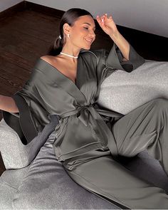 Type: Two-piece Silk Pajama Set.Material: 100% 22 Momme Charmeuse Silk. Indulge in elegance and comfort with this luxurious black silk pajama set. Crafted from high-quality silk, it features a relaxed, oversized fit for a sophisticated yet cozy feel. The set includes a sleek belted top with wide sleeves, adding a modern touch to classic loungewear, and loose-fitting pants for ultimate comfort and ease of movement. Ideal for both lounging and sleeping, this pajama set will elevate your nighttime Silk Set Outfit, Satin Set Outfit, Pijama Outfit, Pyjama Outfit, Elegant Pajamas, Pijamas Women, Satin Pyjamas, Satin Pyjama, Pyjama Satin