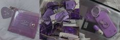 purple heart shaped glasses are on display in a box with tags attached to the side