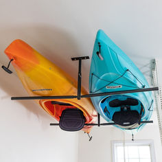 Kayak Ceiling Rack for Garage Boat Storage Ideas Space Saving, Garage Kayak Storage, Kayak Storage Ideas, Kayak Hoist, Sup Storage, Kayak Storage Garage, Kayak Holder, Outdoor Storage Ideas, Kayak Carrier