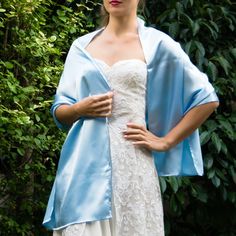 A very elegant satin shawl for your wedding party or evening dress. Made of a classical satin. Color: light blue ( other colors are available ) Size : 170 cm x 40 cm You can use it as a wrap, shawl or stola. WE have matching bags in our Etsy Shop! WE accept credit cards! Elegant Silk Scarf With Satin Finish For Weddings, Elegant Silk Wraps For Wedding, Elegant Silk Wedding Wrap, Elegant Silk Wedding Wraps, Elegant Silk Scarf For Summer Weddings, Spring Wedding Silk Shawl, Elegant Blue Shawl For Spring, Elegant Blue Satin Silk Scarf, Elegant Blue Shawl For Summer