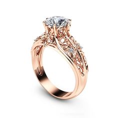 14K Rose Gold Engagement Ring Unique Engagement Ring Rose Gold Moissanite Ring Vintage Engagement Ring. Rose Gold Ring, Rose Gold Engagement, Engagement Ring, Unique Engagement, Diamond Ring, Unique Diamond Ring, Diamond Engagement, Unique Ring, Ayala Jewelry,Vintage Ring, Vintage Engagement, Unique Vintage Ring, Rose Gold Vintage. There is nothing like a gorgeous 14K rose gold engagement ring to set her heart aflutter. Meticulously handcrafted and forged in designer detail, it is a unique diamo Rose Gold Fine Jewelry With Intricate Design For Wedding, Classic Rose Gold Rings With Intricate Design, Rose Gold Rings With Intricate Design, Rose Gold Diamond Ring With Intricate Design As Gift, Rose Gold Diamond Ring With Intricate Design, Luxury Rose Gold Wedding Ring With Intricate Design, Intricate Rose Gold Round Diamond Ring, Intricate Rose Gold Diamond Ring, Luxury Intricate Design Rose Gold Wedding Ring