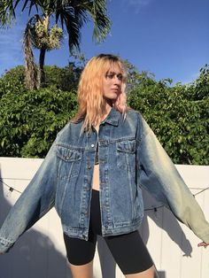 Super cool 1990's trucker denim jacket with embroidery and crazy good sun fades. Bust: 50"Length: 25"Circa: 1990's Condition: Good vintage condition. Fade in weird spots, normal wear. For cool stuff, go here: instagram.com/closetcasevintagePlease contact us about any questions you may have regarding condition before purchasing. Please read our store policies. Vintage Denim Jacket For Summer Streetwear, Faded Grunge Denim Jacket For Streetwear, Faded Stonewashed Denim Jacket For Streetwear, Spring Faded Denim Jacket For Streetwear, Oversized 90s Denim Jacket For Streetwear, Faded Denim Jacket For Spring Streetwear, 90s Oversized Denim Jacket For Streetwear, 90s Washed Denim Jacket For Streetwear, Vintage Acid Wash Denim Jacket For Streetwear