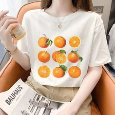 Orange aesthetic tee ✨ Perfect shirt fit made from 100% mid-weight US cotton ✨ Loose fit for comfort If you wish to customize the design, tweak it slightly, or alter the color scheme, kindly reach out to us prior to placing your order. We recommend selecting your usual size for a normal fit (unless you have a larger chest, in which case, size up). When selecting colors, please consider that the print shade may vary slightly due to monitor settings and tee color. 📦 HOW TO ORDER Kindly review the Aesthetic Fruits, Comfort Aesthetic, Aesthetic Tees, Aesthetic Fruit, Peach Graphic, Lemon Shirt, Tree Aesthetic, Boho Orange, Fruit Shirt