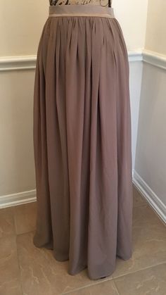 This Skirt is made of the softest chiffon and would be the perfect Wedding Skirt or Bridesmaid Dress. It can be made in ANY color, ANY length, and ANY size. Add Color desired in Personalization area when purchasing. ALL ITEMS HANDMADE BY ME IN USA Lining and waistband are made with a soft satin fabric of the same or contrasting color as the chiffon. The satin waistband is flat with zipper and hook/eye closure in back. Elastic can be added to the back of the waistband, however only allows for a l Long Gold Skirt, Skirt Bridesmaid Dresses, Grey Tulle Skirt, Tulle Skirt Bridesmaid, Bridesmaid Dress Chiffon, Long Chiffon Skirt, Pink Maxi Skirt, Skirt Beach, Bridal Skirts