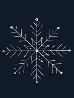 a white snowflake on a black background