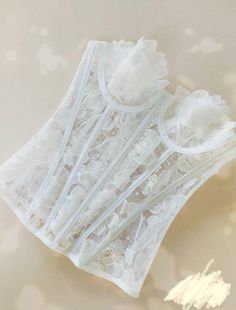 "White Lace Bridal Corset Top, White lace bustier top, Ivory bridal corset, Lace Plus Size Corset, Lace Corset Tops With Lace Back Material: High quality embroidered lace, high quality wedding tulle, high quality plastic splint, stainless steel hooks and other materials Colors: White corset, Ivory Corset Size chart: ASIAUK EUUS BUST WAIST HIPS InchsCm InchsCm InchsCm S 6-834-362-4 32-3481-8624-2661-6634-3686-91 M 8-1036-384-6 34-3686-9126-2866-7136-3891-96 L 10-1238-406-8 36-3891-9628-3071-7638- Wedding Corset With Delicate Lace, Elegant Lace Wedding Corset, Lace Bodice With Boning, Elegant Lace Wedding Night Corset, Elegant Lace Corset For Wedding Night, White Feminine Lace Top, Sweetheart Neckline Lace Corset, Fitted Delicate Lace Corset, Elegant Lace Bodice With Corset Back