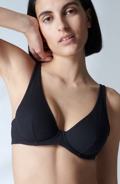 Designed in France, this underwire bra offers divine comfort and a flattering shape with a stretchy rib and supportive underbust band. 81% polyamide, 19% elastane Hand wash, dry flat Imported Fitted Low-cut Nursing Bra With Padded Cups, Fitted Underwire Nursing Bra With Medium Support, Low-cut Fitted Nursing Bra With Padded Cups, Fitted Low-cut Padded Nursing Bra, Padded Fitted Low-cut Swimwear, Seamless Sculpting Underwire Swimwear, Fitted Low-cut Padded Swimwear, Sculpting Seamless Underwire Swimwear, Fitted Low-cut Nursing Bra With Removable Pads