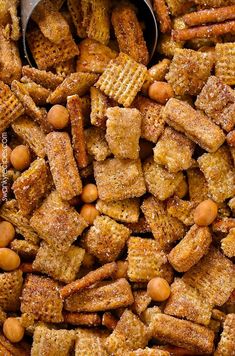 a pile of cornbread and chickpeas snack mix with a spoon in it