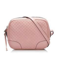 This Pre-Owned Gucci GG Leather Bree Crossbody Bag is perfect for those who want to add a touch of luxury to their outfit. The bag features a beautiful brown GG leather fabrication, which gives it a classic and timeless look. Bag Silhouette: Crossbody Bags Color: Pink Fabrication: GG Leather Closure Type: Zip The adjustable flat leather shoulder strap ensures that the bag can be worn comfortably over the shoulder or across the body. The top zip closure provides secure storage for your belongings Luxury Pink Gucci Shoulder Bag, Gucci Bree Crossbody Bag, Burberry Sunglasses, Contemporary Eclectic, Alessandro Michele, Carry All Bag, Luxury Goods, Fashion House, Small Leather Goods