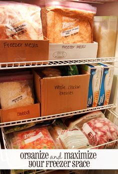 an open refrigerator filled with freezer meals and packaged food in boxes on the shelves