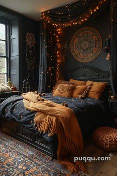 a bedroom with lights strung from the ceiling and a large bed in front of a window