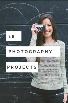 a woman holding up a camera in front of a black wall with the words 16 photography projects