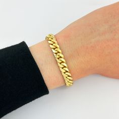 This 8mm Miami Cuban Link Bracelet is made in Solid 18k Yellow Gold and is secured with a Box-Lock Clasp. Perfect for any occasion, this bracelet guarantees you that rich and luxurious look! Mour & Co. is a reputable jewelry company that has been in the jewelry industry for MANY years. I deeply value all of my clients, therefore, I only provide you with the highest-quality jewelry and phenomenal customer service. All of my jewelry is crafted from real, genuine solid gold so it can be enjoyed for a lifetime without fading, tarnishing, or turning green. Orders are fulfilled within 1-2 business days ensuring a fast delivery--YOUR happiness is MY happiness! * DETAILS: Width: 8mm Length: Use the drop-down menu to select your preference! Metal: 18k Yellow Gold - SOLID GOLD (not hollow or semi-ho Luxury Cuban Link Bracelet For Formal Occasions, Luxury Gold Bracelet With Curb Chain, Classic Cuban Link Diamond Bracelet As A Gift, Classic Cuban Link Diamond Bracelet Gift, Elegant Cuban Link Bracelets For Anniversary, Luxury Cuban Link Bracelets For Anniversary, Luxury Curb Chain Bracelet As Gift, Luxury Curb Chain Bracelet For Gift, Luxury Cuban Link Chain Bracelet As Gift