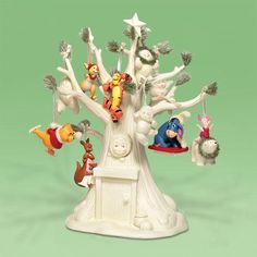 winnie the pooh figurine tree with many characters