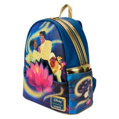 Celebrating 15 years of Disney’s The Princess And The Frog, this mini backpack shows Princess Tiana and her friends from the bayou. Metallic gold accents give the bag a royal shine, and trails of fireflies give the design a soft glow. This backpack is an officially licensed Disney product. Dimensions: 9”W x 10.5”H x 4.5”D Material: Faux leather (polyurethane) Features: Adjustable shoulder straps, front zipper pocket, side drop pockets, shiny gold hardware, and applique, embossed, metallic, glow- Disney Princess And The Frog, Charlotte La Bouff, Tiana And Naveen, Prince Naveen, Lilo Et Stitch, Mini Mochila, Princess And The Frog, Princess Tiana, 15th Anniversary