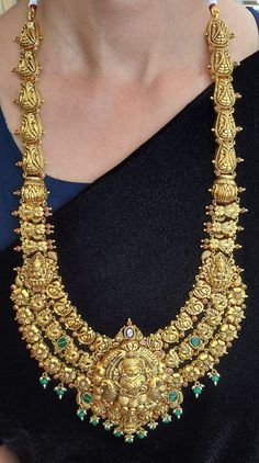 22 karat gold "lakshmi - peacock" long necklace with color stones, pearls & beads (temple jewellery)

  exude elegance with our 22 karat gold "lakshmi - peacock" long necklace  indulge in the rich cultural heritage of india with our exquisite 22 karat gold "lakshmi - peacock" long necklace. handcrafted with intricate detailing, this stunning piece features colorful stones, pearls, and beads that add a touch of glamour to any outfit. the temple jewellery design exudes traditional charm, Gold Arm Cuff, Toes Ring Silver, 22k Gold Bangles, Temple Jewelry Necklace, Gold Temple Jewellery, Diamond Earrings For Women, Gold Initial Pendant, Diamond Pendant Sets, 22k Gold Jewelry