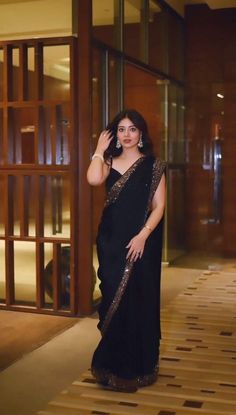 Party wear soft Georgette black saree for women, designer reception saree with fancy border, Indian saree for function, evening wear saree 1) Saree Details :  Saree Color: Black  Saree length: 5.5 meter. Saree Work : Thread with Sequence  Saree Fabric:  Soft Georgette  Saree type: Sequence embroidery saree 2) Blouse Details : (Semi Stitched) Blouse Color : Matching Blouse Length : 0.8 Meter Blouse Work : Plain  Blouse Fabric:  Mono Silk  Blouse wear by model is just for modeling purpose only actual blouse may vary. For more collection please visit : https://etsy.me/42iJXRw Washing Care : Dry Clean only Made for : Women Occasion : Farewell, Traditional, Wedding, Reception, Engagement, Festive, Casual, Party, Functions, Gift etc. WE ALSO TAKE BULK ORDERS FOR WEDDINGS AND OTHER OCCASIONS Note Saree For Function, Reception Saree, Sequence Saree, Saree Designer, Fancy Sarees Party Wear, Modern Saree, Saree For Women, Party Wear Saree, Ready To Wear Saree