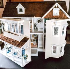 a doll house with all the furniture and accessories