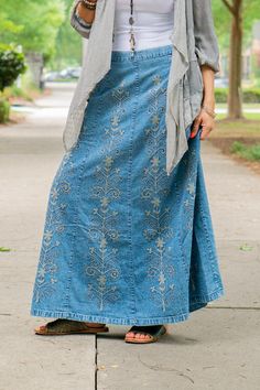 The Rachel Embroidered Skirt in Blue - SpiritedBoutiques Boho Hippie Boutique Style Skirt, Young Threads Bohemian Embroidered Fitted Skirt, Blue Floral Embroidered Wide Leg Bottoms, Casual Embroidered Relaxed Skirt, Casual Long Skirt With Floral Embroidery, Long Embroidered Cotton Skirt, Casual Relaxed Embroidered Skirt, Casual Embroidered Relaxed Fit Skirt, Bohemian Style Blue Relaxed Maxi Skirt, Spring Embroidered Midi Skirt