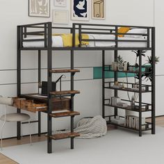 a loft bed with desk underneath it and stairs to the upper level, in a room with white walls