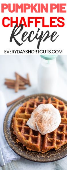 pumpkin pie waffles recipe on a plate with whipped cream and cinnamon sticks in the background