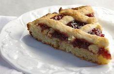 a piece of pie sitting on top of a white plate