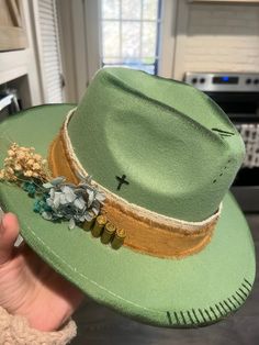 Custom handmade distressed felt Panama hat in teal. Perfect for concerts and country venues. Adjustable Green Fedora Felt Hat, Western Green Hat Band For Festivals, Western Green Hat Bands For Festival, Green Western Style Hat Band For Festivals, Adjustable Green Hats For Festivals, Adjustable Green Hat For Festival, Adjustable Green Hat For Festivals, Green Adjustable Felt Hat For Kentucky Derby, Green Flat Brim Hat For Country Events