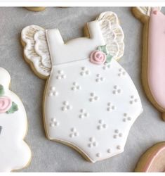 decorated cookies are displayed on a table