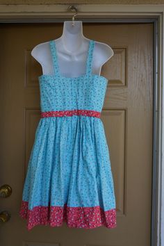 "Cute floral wench dress. Hand made. Zips in the back. In very good condition. No tags - please see measurements. Estimated size Small to Medium. Measurements taken across front laid flat 17\" across front armpit to armpit 14\" across front of waist (ties tighter) 36\" length shoulder to bottom" Cotton Sundress With Fitted Bodice, Spring Sleeveless Prairie Dress, Peasant Cotton Dress For Garden Party, Peasant Style Cotton Dress For Garden Party, Peasant Sleeveless Dresses For Spring, Peasant Style Sleeveless Summer Dress, Sleeveless Peasant Dress For Spring, Sleeveless Peasant Summer Dress, Spring Sleeveless Peasant Dress