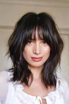 Heavily layered shag haircut with fringed layers for a tousled look. Shag With Fringe Bangs, Shag With Fringe, Layered Shag With Fringe