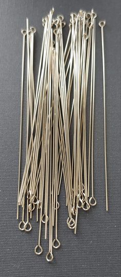 PRICES MAY VARY. Our 3" Wire Wrapper Eyepins are totally AWESOME!!! Choose 3" Wire Wrappers for tight, beautiful and remarkable wraps. Made in USA. Wire Wrapper Eye Pins 3" 22 Gauge Nickel Silver (Pack of 50). Made in USA. Use with Our Snapeez Jump Rings. The Ultra Secure | No Solder Jump Ring. Wire Wrapped Jewelry Diy, Silver Eye, Semi Precious Jewelry, Wire Work Jewelry, Eye Pins, Wire Weaving, Nickel Silver, Pin Jewelry, Jewelry Tools