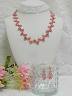 "I hand beaded 75 Genuine \"S\" Crystal 4mm Rose Bicones and 78 Czech glass round 4mm Alabaster Pastel Pink beads into a triangle weave along with MIYUKI 11/0 Galvanized Rose Gold seed beads with a picot stitch at the point of each triangle to make the 19 inch necklace. The necklace is completed with a 14K Rose Gold filled spring ring that is securely attached with 14K Rose Gold Filled thread protectors to avoid wear on the pink One G green thread. The necklace also includes a REMOVABLE 3 inch G Pink Round Jewelry With Bead Caps, Pink Spacer Beads Wedding Jewelry, Pink Spacer Beads Jewelry For Wedding, Picot Stitch, Green Thread, Jewelry Swarovski, Pearl Rose, Swarovski Crystal Jewelry, Swarovski Necklace