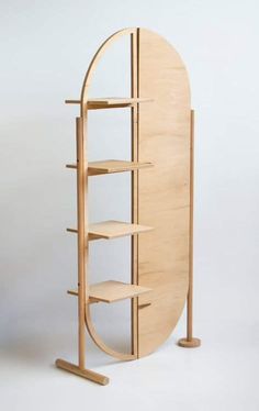 a wooden shelf with three shelves on each side and a circular opening in the middle