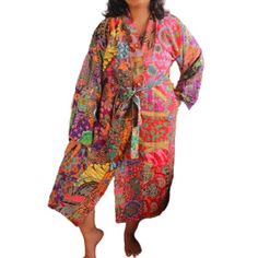 "This is a washable printed batik robe/ kimono long, handmade by artisans. Two side pockets Removable waist tie closure Belt loops and inside ties to secure closure Side slits at hem Machine washable in cold and machine dry in delicate setting. This is made of printed batik fabric and not wax and dye batik fabric. Cotton Kimono, Kimono for Women, Woman Kimono, Women robe, Woman Robe, Batik Clothing, Batik Robe, Batik Kimono, Artisan Clothing, Cotton Robe, Woman Cotton Robe, Grey, Grey Robe, Grey Kimono Batik, Kimono Quilt, Woman Kimono, Batik Kimono, Artisan Clothing, Batik Clothing, Boho Robes, Kimono Women, Women Robe