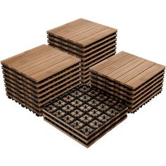 several pieces of wood are stacked on top of each other