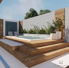 an outdoor hot tub surrounded by wooden steps and planters on the side of a building