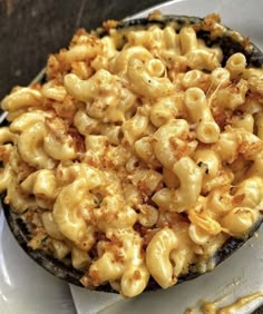 macaroni and cheese in a skillet on a plate