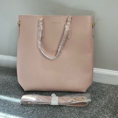 Brand: Michael Kors Size: Large Color: Blush Pink Brand New, Can Be Used As Crossbody Or Tote, Comes With Strap. Michael Kors Everyday Satchel With Double Handle, Michael Kors Everyday Tote Satchel, Michael Kors Double Handle Satchel For Everyday, Pink Satchel For Everyday, Feminine Tote Satchel For Shopping, Michael Kors Double Handle Bags For Daily Use, Everyday Michael Kors Satchel, Michael Kors Bags For Errands, Blush Bag With Adjustable Strap For On-the-go