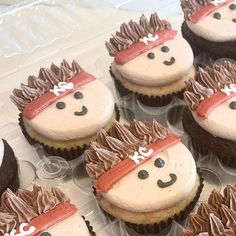 cupcakes with frosting decorated as hedgehogs and pirate hats on them