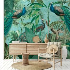 a wall mural with peacocks and tropical plants on the walls in a living room