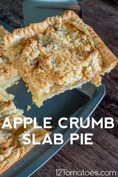 an apple crumb slab pie on a plate with the words, apple crumb slab pie