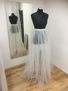 Long tulle skirt for wedding dress. Feminine touch for your wedding day.  Other colors available in listing:  https://www.etsy.com/listing/248828084/bridal-tulle-long-sheer-skirt-tutu?ref=shop_home_feat_3 Sheer on front and less sheer on sides and bottom. * Not lined - they are supposed to wear on dress, you can make simple dress your wedding dress only with these skirts. * satin waistband, 1.5" or 4cm waistband by default. Can be made shiny or matte by request, can also be made wider or thinner Tulle Wedding Dress With Detachable Train, Tulle Wedding Dress With Detachable Train For Bride, Long Train Tulle Dresses, Bridal Tulle Wedding Dress With Long Train, Long Sheer Tulle Skirt, Floor-length Tulle Wedding Dress For Bride, Wedding Dress With Tulle Skirt And Long Train, Wedding Skirt With Tulle And Long Train, Fitted Tulle Wedding Dress With Tulle Skirt