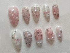 ✨ Elegant Bridal-Inspired Press-On Nail Set ✨ This luxurious, handcrafted nail set is perfect for brides, bridesmaids, or anyone seeking a touch of elegance. Each nail is meticulously designed to create a timeless, romantic look that will elevate your style for weddings, engagements, or special occasions. 🌸 Soft Pink Floral Accents with Pearls The delicate pink nails feature intricate 3D floral designs, paired with dainty pearls to add sophistication and charm. Perfect for a feminine and graceful touch that will capture everyone's attention. 💍 Heart and Bow Charms One of the nails is adorned with a heart and bow charm, symbolizing love and elegance. This unique detail makes it a lovely choice for engagement or wedding themes, adding a sweet and romantic vibe to your look. 🎀 Swan-Inspire Wedding Nails Chrome, Gel Nails Floral, Chrome Almond, Nail Art Blanc, Nails Floral, Nails Chrome, Romantic Nails, Acrylic Press On Nails, Pretty Gel Nails