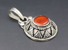 Offering you Afghan traditional belly dance kuchi round pendant. Its %100 hand crafted workmanship with beautiful Glass Carnelian pendant. Please do not hesitate to contact if you have any questions about items or further informations, Measures: 3.5cm x 2.5cm ( 1.4" x 1" ) Weight : 13.0 Grams, You will get all the pendants shown in pictures. Please know what you are bidding on. Most Kuchi and Turkoman items are old, used items that have a distinct patina. There may be chips, missing glass bits, Traditional Pendant, Afghan Jewelry, Carnelian Pendant, Round Circle, Unique Pendant, Circle Pendant, Round Pendant, Belly Dance, Favorite Jewelry