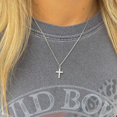 This crystal cross necklace is a classic! Perfect gift for a special occasion and can be worn on the daily as it is waterproof! Details: 16 inch chain Stainless steel Made in the USA Crucifix Charm Necklaces For Gifts, Gift Crucifix Charm Necklace, Everyday Cross Pendant Necklace, Silver Cross Pendant Charm Necklaces, Sterling Silver Cross Pendant Charm Necklace, Everyday Cross Charm Necklace With Clavicle Chain, Everyday Cross Necklace With Clavicle Chain, Silver Crucifix Cross Necklace For Everyday, Everyday Clavicle Chain Cross Necklace