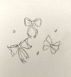 two bows drawn on paper with black ink