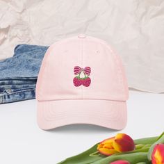 Coquette Strawberry Embroidered Pastel Baseball Hat, Cute Aesthetic Bow Hat, Strawberry Lover Summer Cap, Gift For Girlfriend, Gift For Her The pastel baseball hat's made of 100% chino cotton. It has an unstructured crown, 6 panels, and a low-profile design. But more importantly, this unique hat will complement your one-of-a-kind outfits! * 100% chino cotton * Soft, unstructured crown * 6-panel, low-profile * Pre-curved peak * Stitched eyelets * Self-fabric strap with a tri-glide buckle * Sponge Coquette Strawberry, Aesthetic Bow, Summer Cap, Pastel Mint, Unique Hats, Fabric Strap, Cute Aesthetic, Sponge Cleaning, Girlfriend Gift